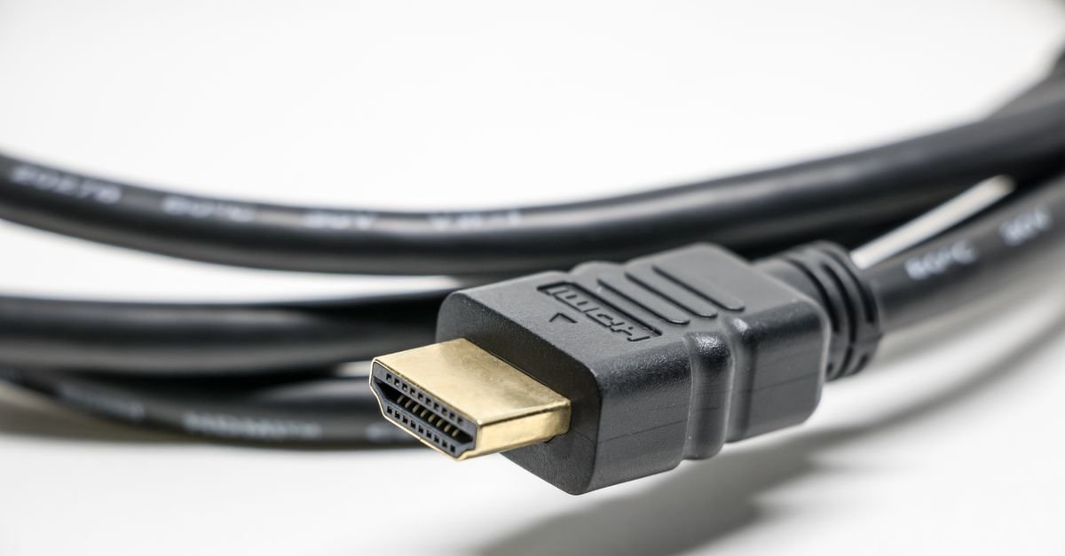 Reseating an HDMI cable to fix a flickering monitor