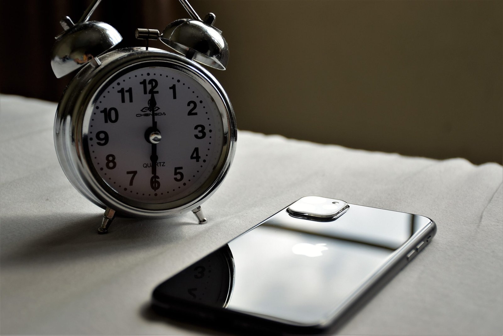 Your iPhone Alarm Keeps Getting Quieter? The 4 Real Causes — and How to Lock It Loud