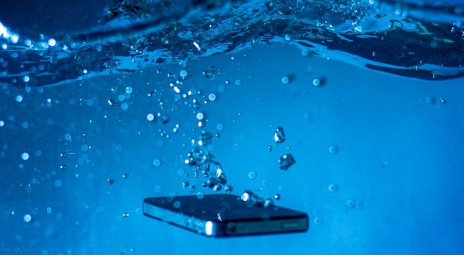 Smartphone buried in a bag of rice
